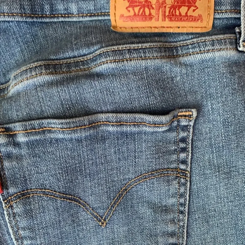 Levis rolled hem distressed jean shorts 29